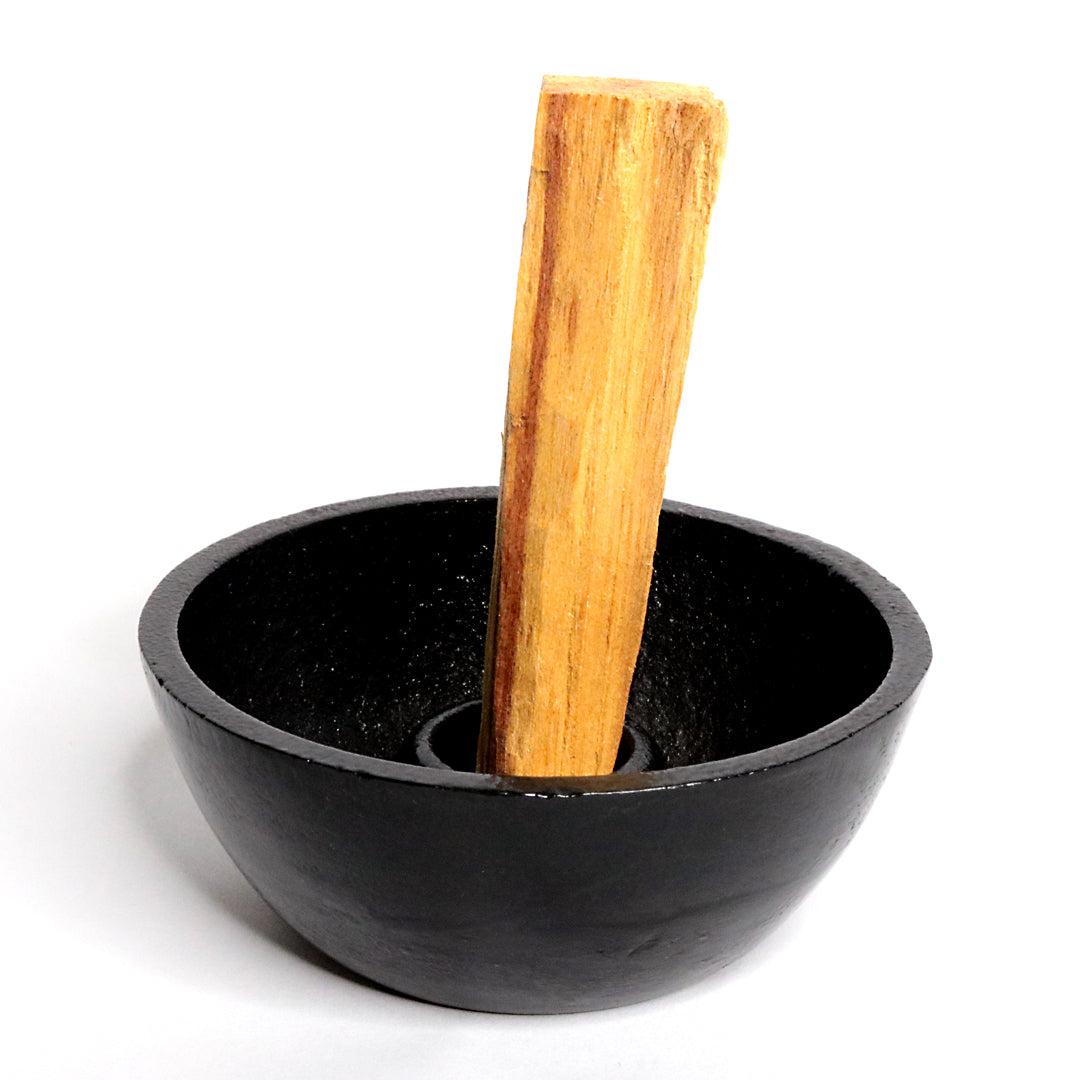 Black cast iron bowl great for safely smudging your home with sage or palo santo.